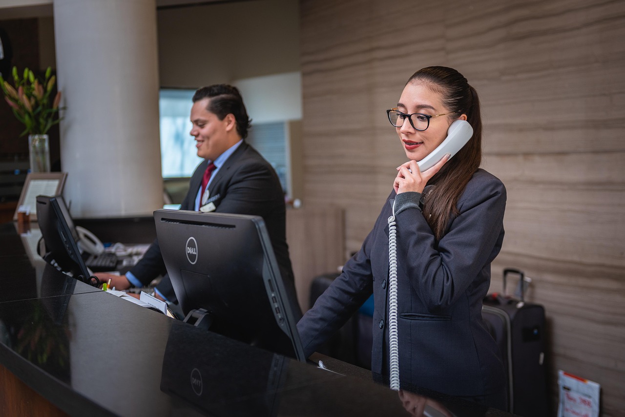 receptionists, phone call, hotel, reception, woman, man, work, attention, lobby, employees, professional, company, assistance, hotel, hotel, hotel, hotel, hotel